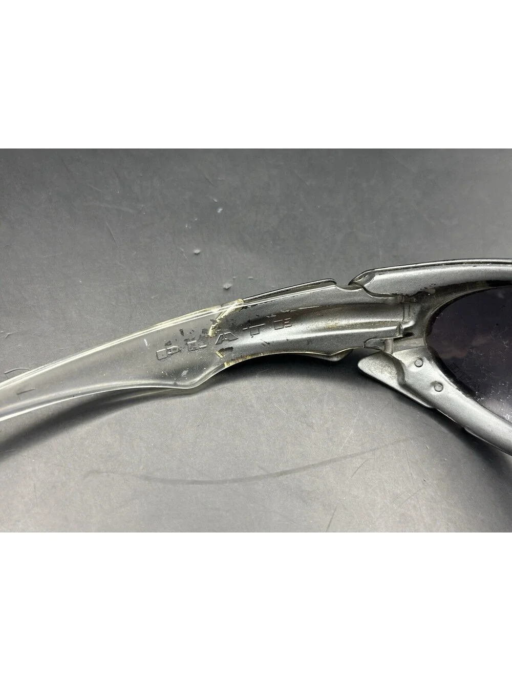 Oakley Plate Dark Silver/Black Iridium Lenses